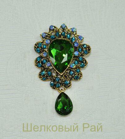 Брошь декоративная Звезда Востока с зеленым камнем